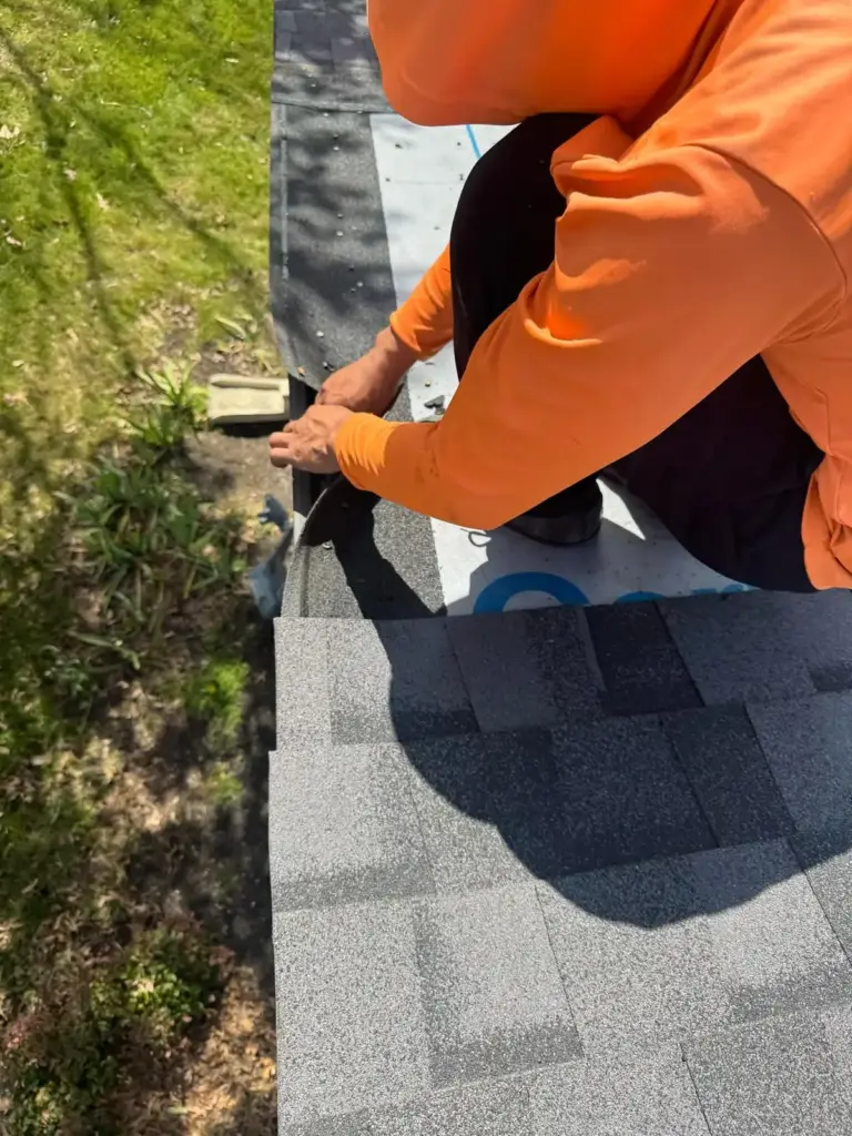 Casas Pro crew member working on a residential roof in DFW